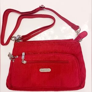 Baggallini red crossbody bag, water resistant.  NWOT